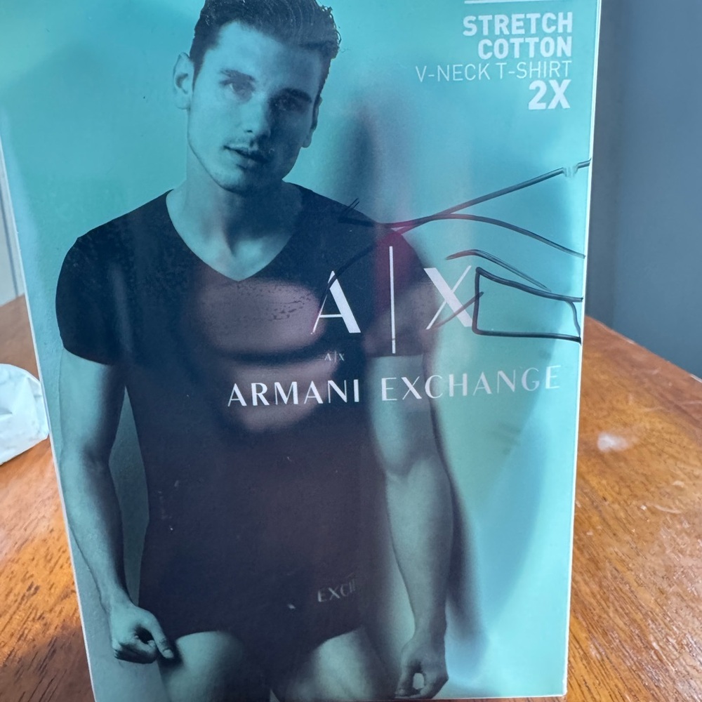 Armani Exchange V Neck T shirts. Never worn. Size large.